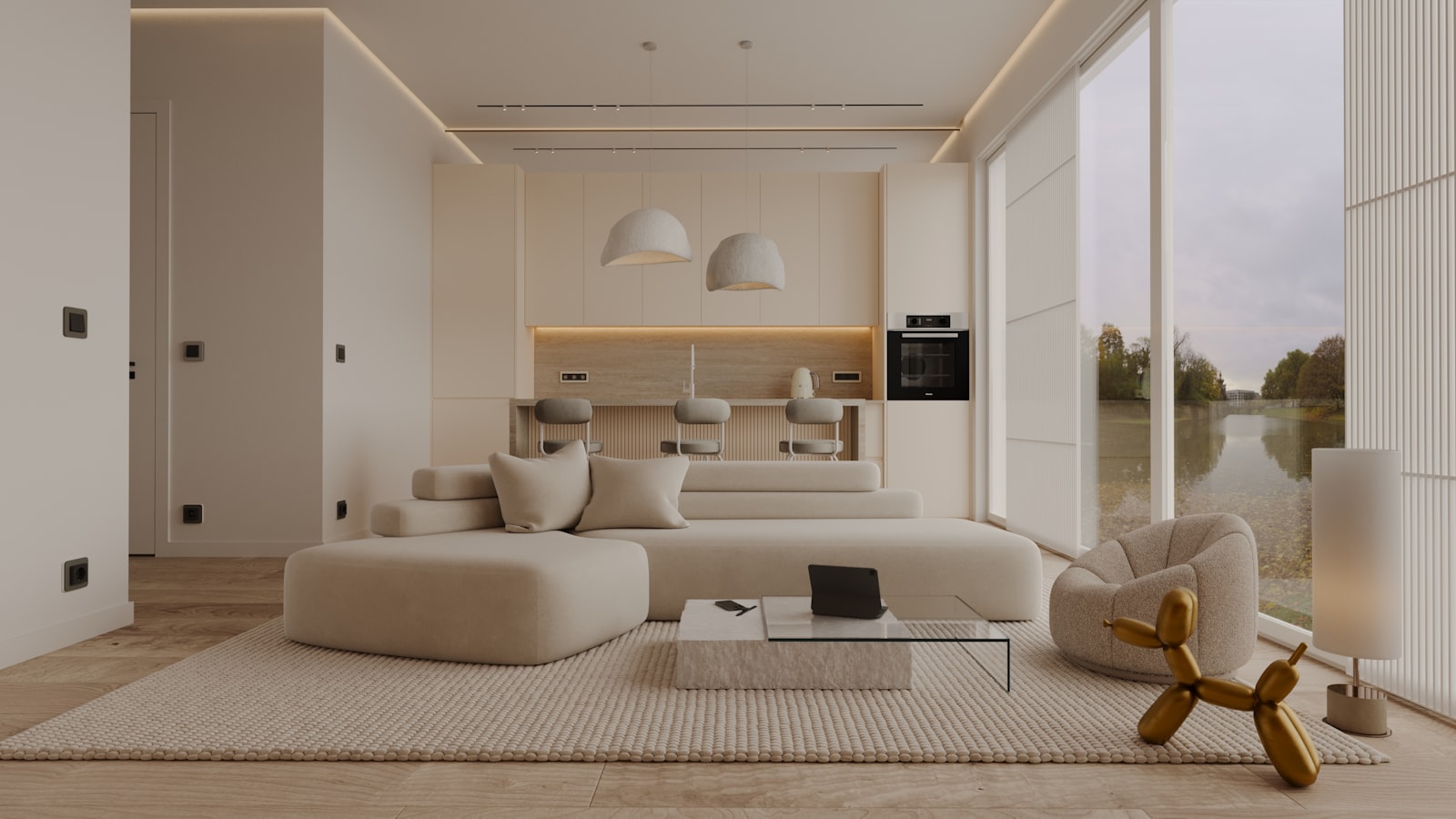 Bright, modern open-plan living room and kitchen with lake view
