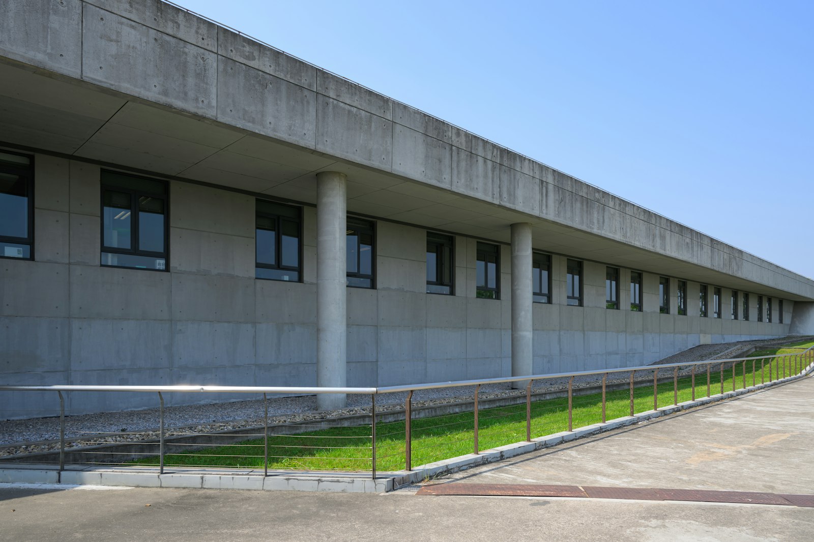 Modern purpose-built accessible housing exterior with wheelchair ramp